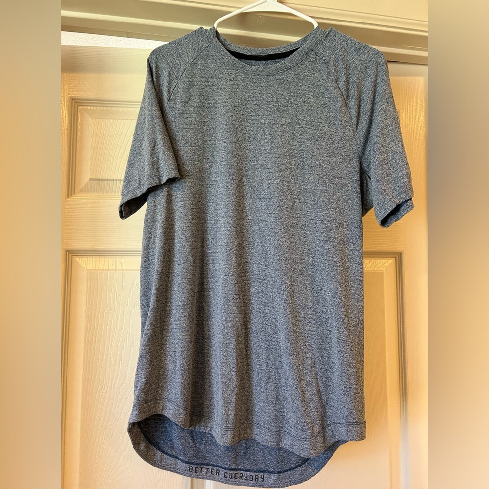 Two Lululemon License to Train tees, one gray one blue
